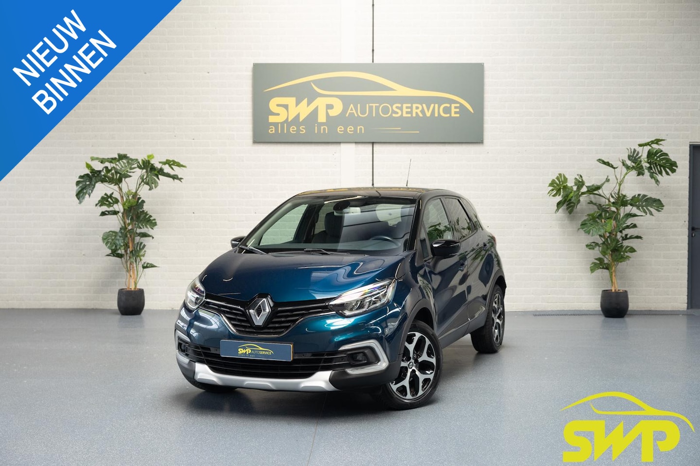 Renault Captur - 1.2 TCe Intens | Navi | Camera | Trekhaak - AutoWereld.nl