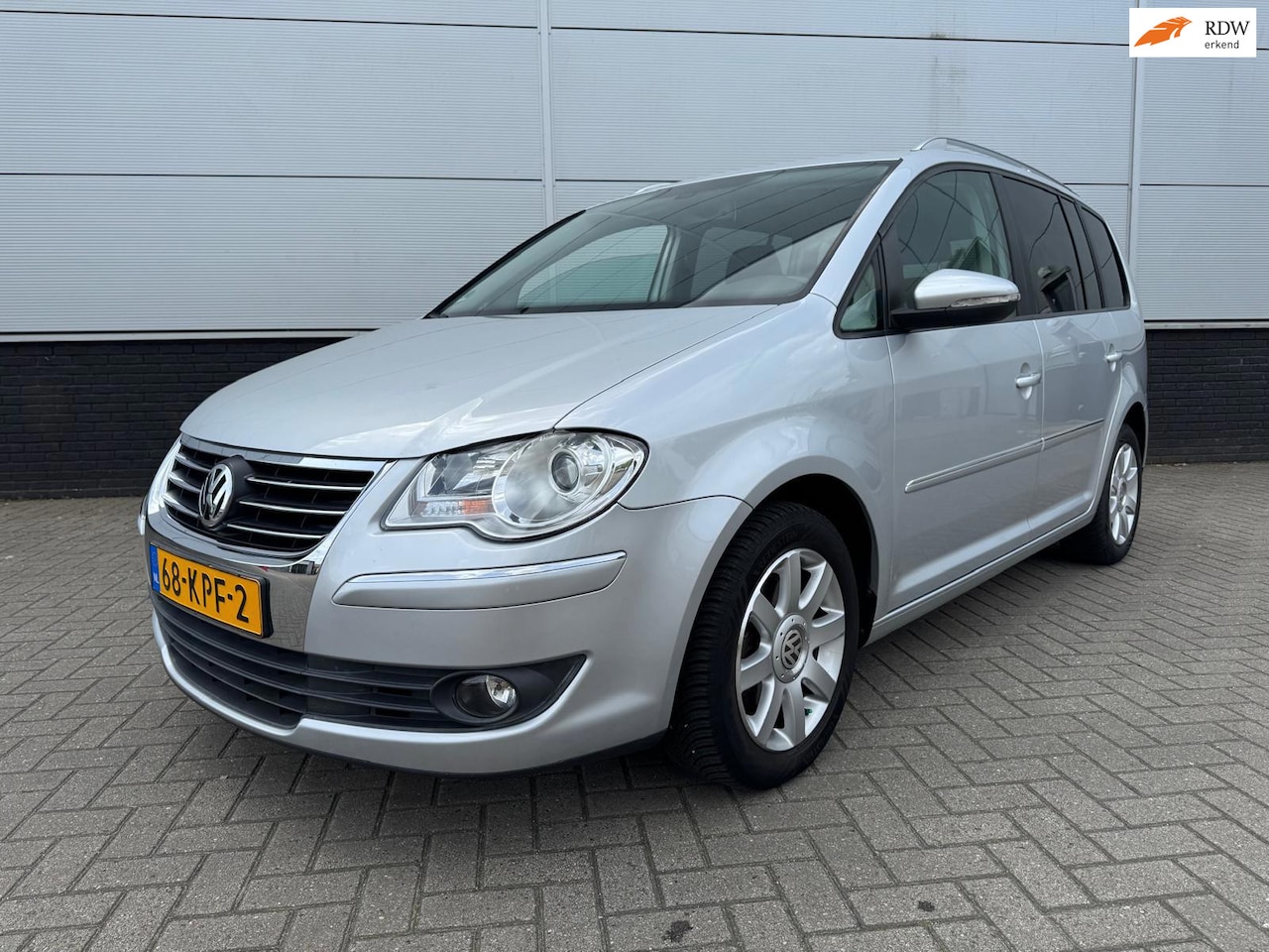Volkswagen Touran - 1.4 TSI Highline NAP * clima * cruise * trekhaak * 1e eigenaar - AutoWereld.nl