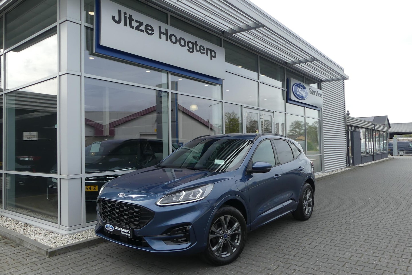 Ford Kuga - 2.5 PHEV ST-Line X ELEKT. TREKHAAK (1.500KG), HUD, WINTER PACK, ADAPT. CRUISE, CLIMA, NAVI - AutoWereld.nl