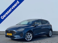 Ford Fiesta - EcoBoost Hybrid Titanium X | Winterpack | Adapt. Cruise | Camera | Navi | 1e eigenaar | LE