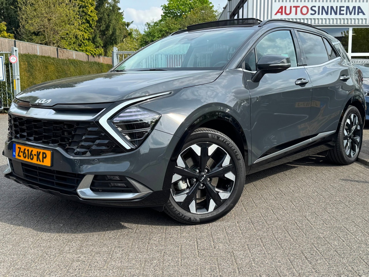 Kia Sportage - 1.6 T-GDi Plug-in Hybrid AWD DynamicPlusLine | Trekhaak | 1e eigenaar | Panoramadak | Stuu - AutoWereld.nl