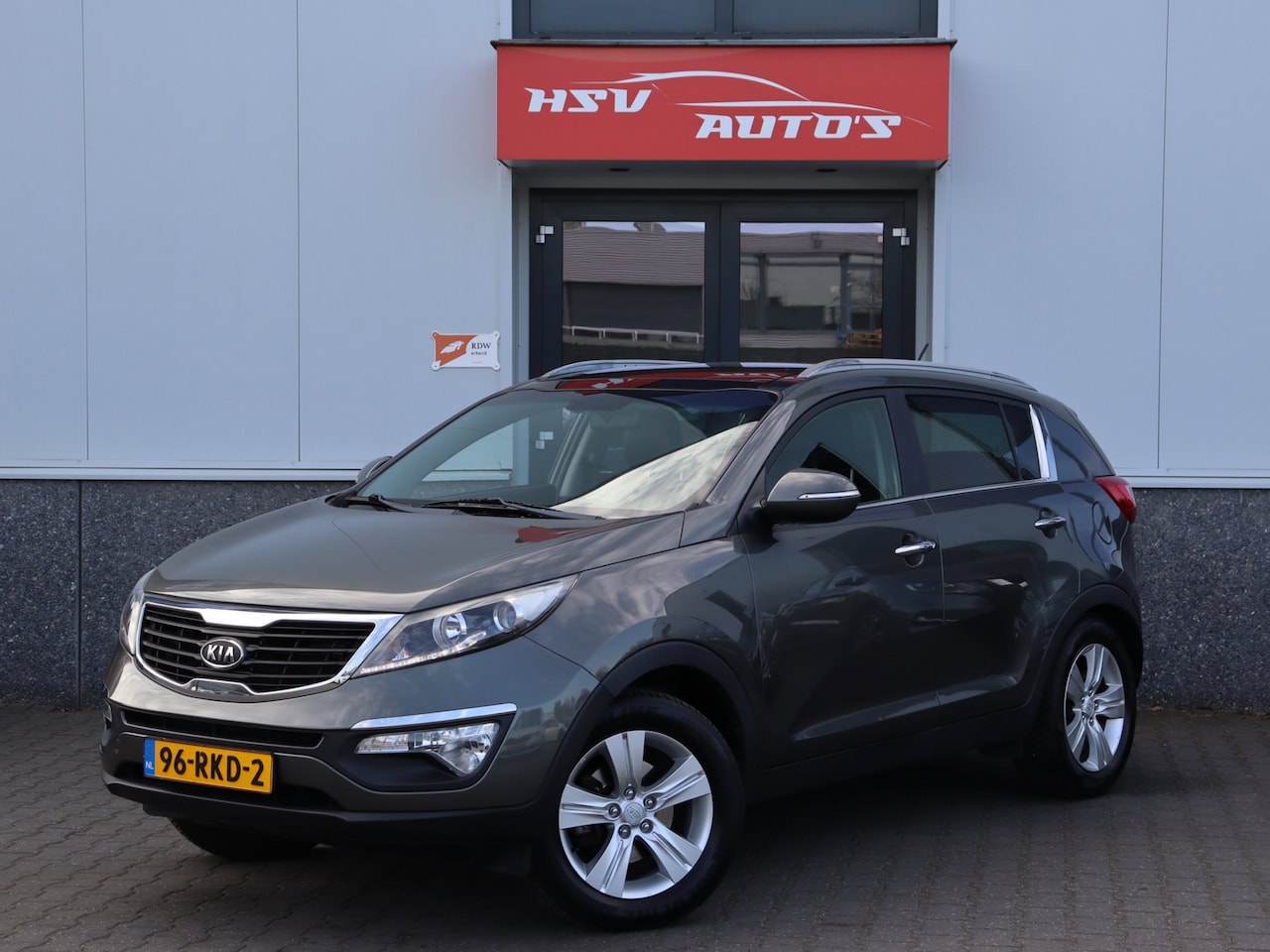 Kia Sportage - 2.0 X-ecutive Plus Pack airco LM panodak org NL - AutoWereld.nl