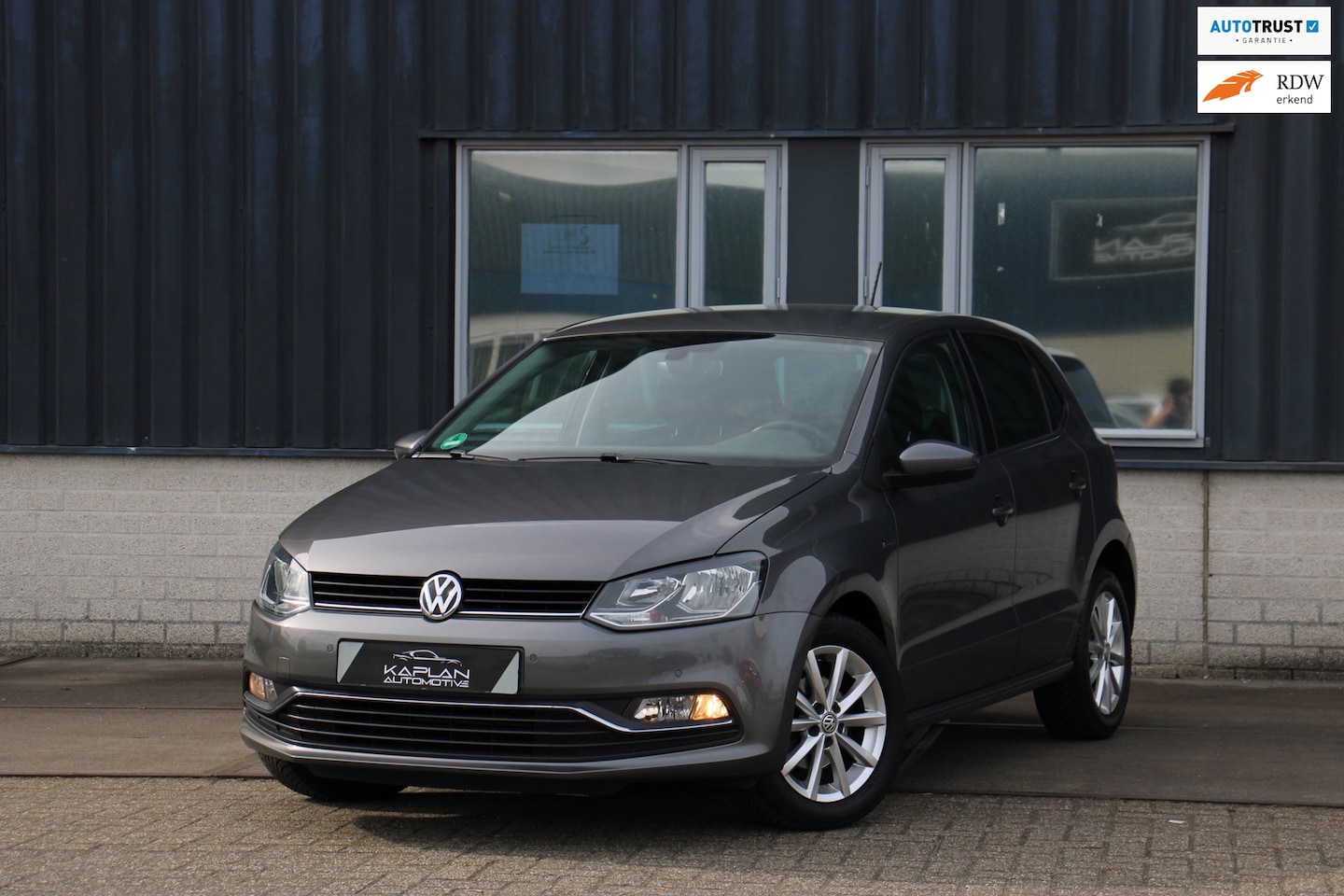 Volkswagen Polo - 1.2 TSI Lounge Cruise Climate PDC LMV BT - AutoWereld.nl
