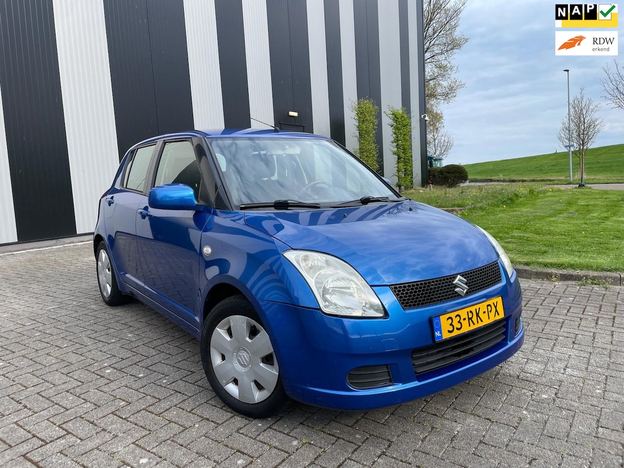 Suzuki Swift - 1.3 GLS Airco-Elekpakket-Trekhaak-2 Sleutels - AutoWereld.nl