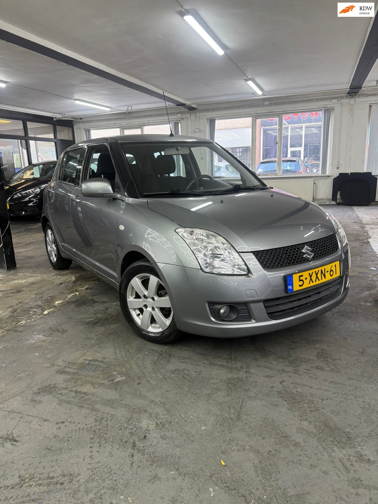 Suzuki Swift - 1.3 Comfort Automaat | Airco | dealer onderhouden - AutoWereld.nl