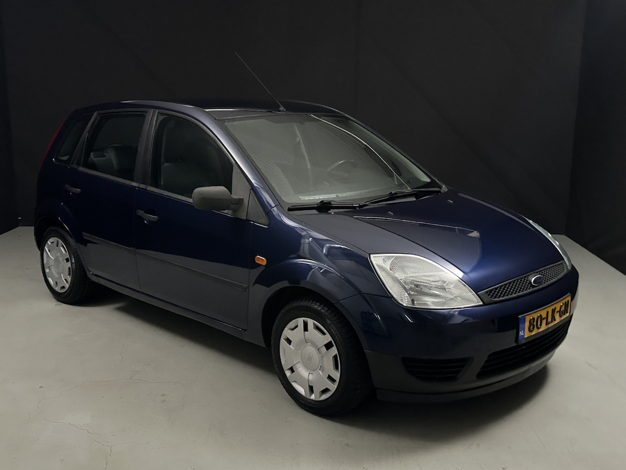 Ford Fiesta - 1.3 Ambiente *Lage KM* - AutoWereld.nl