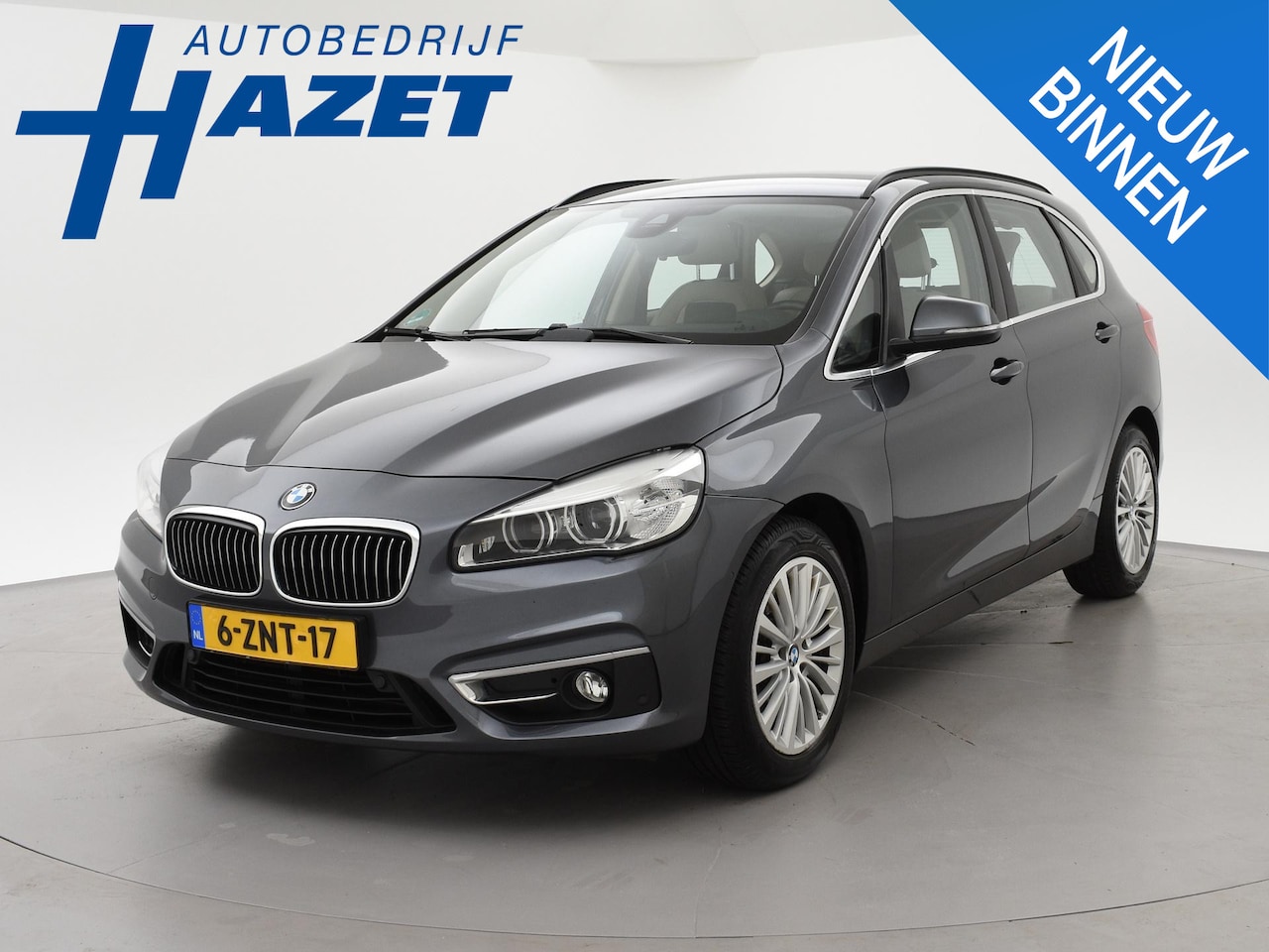 BMW 2-serie Active Tourer - 225i H.E. 230 PK AUT. *81.089 KM / ORIG. NL* + CARPLAY | HEAD-UP | LEDER | SFEERVERL. | ST - AutoWereld.nl