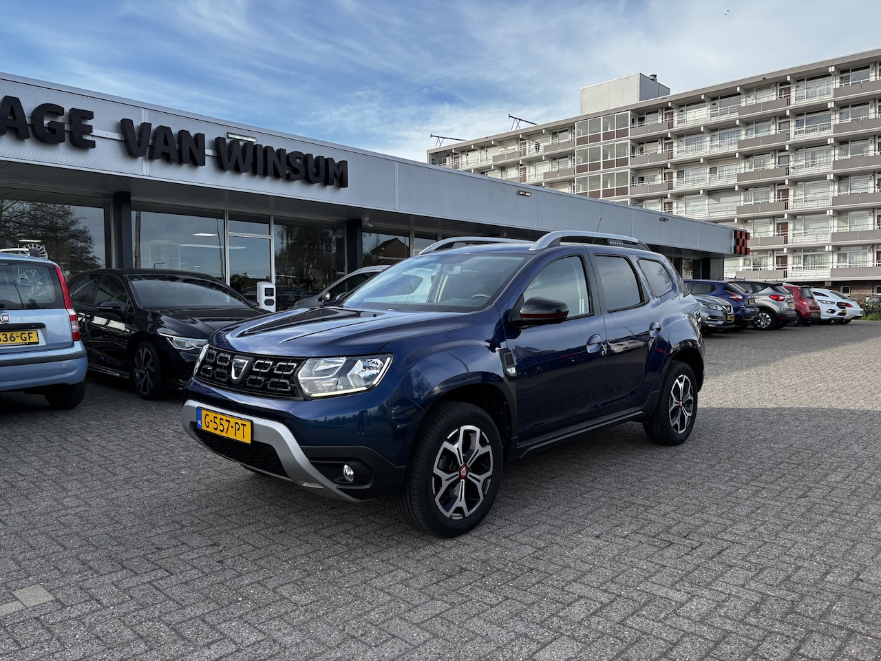 Dacia Duster - 1.3 TCe Tech Road Lmv Pdc Navi Trekhaak Acamera Klima Cruise Nap - AutoWereld.nl