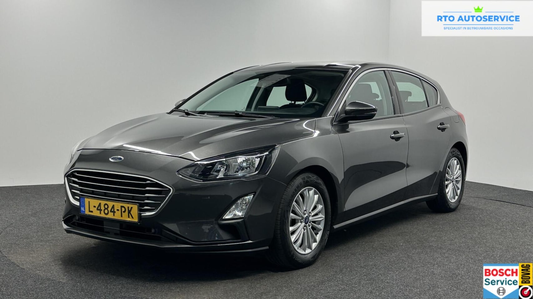 Ford Focus - 1.0 EcoBoost Titanium Business TREKHAAK ECC NAVI CRUISE LM. - AutoWereld.nl
