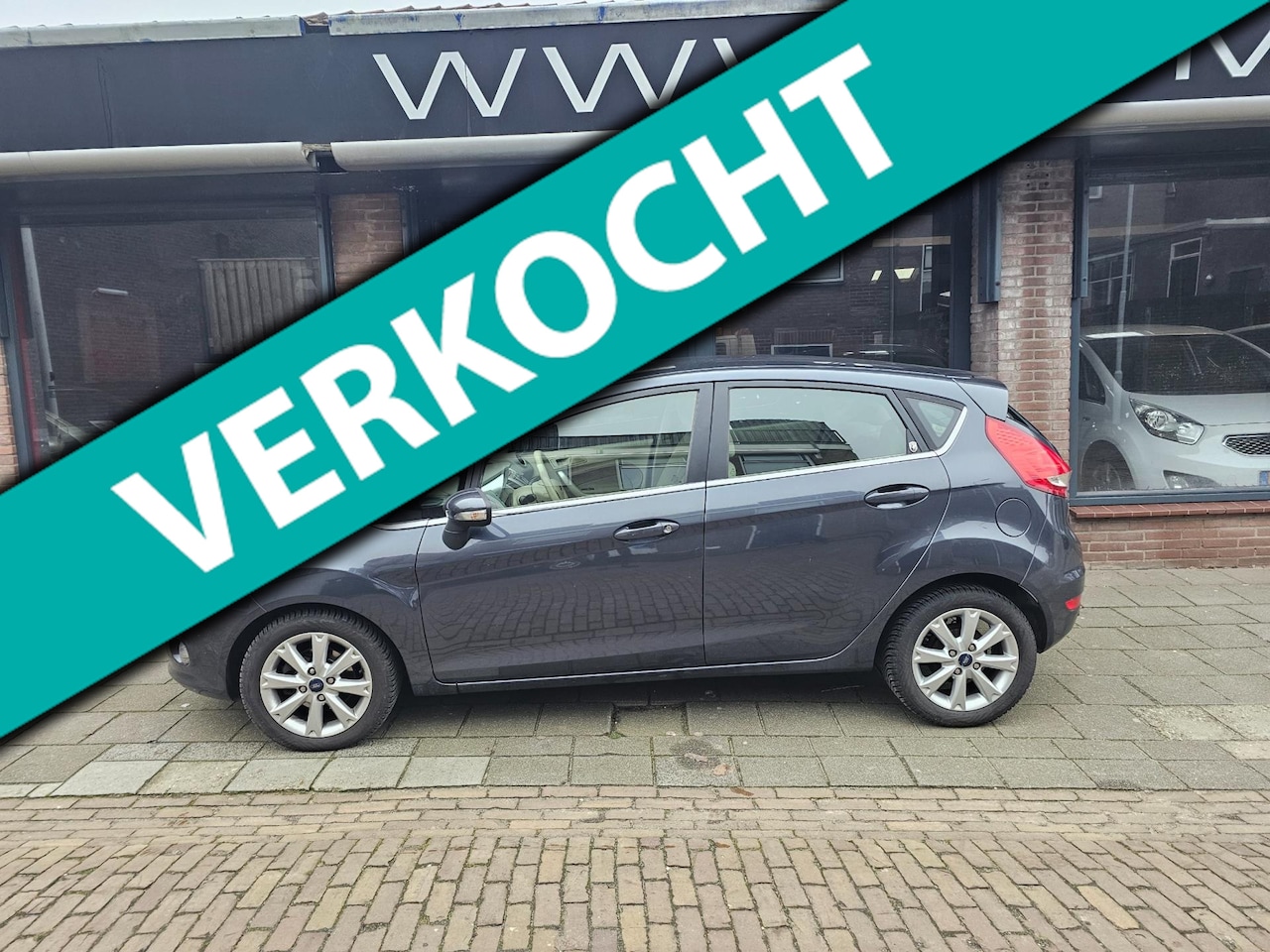 Ford Fiesta - 1.25 Ghia 1.25 Ghia , luxe uitvoering ! - AutoWereld.nl