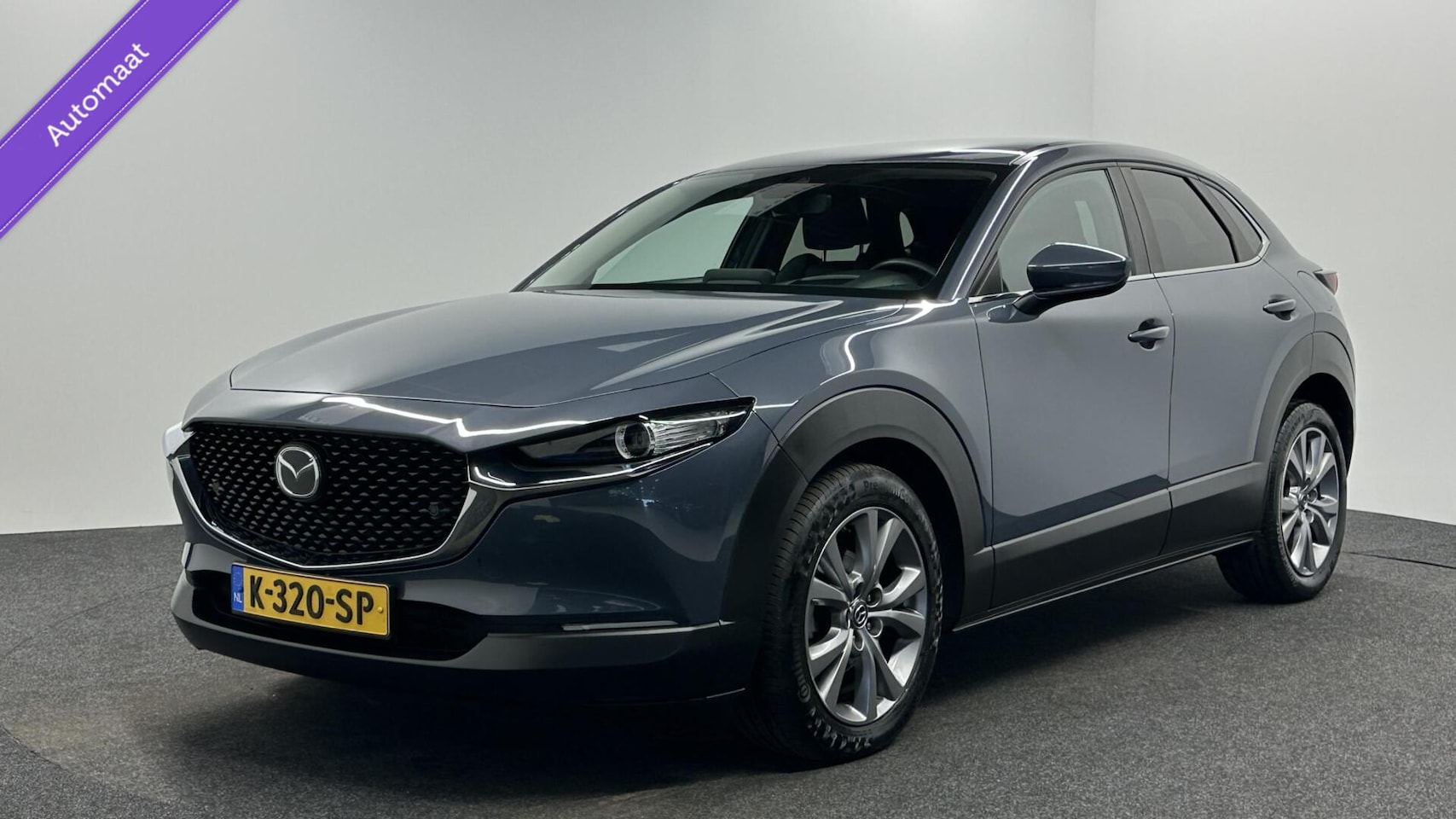 Mazda CX-30 - 2.0 e-SkyActiv-X M Hybrid Comfort CAMERA CARPLAY ECC CRUISE NAVI. - AutoWereld.nl