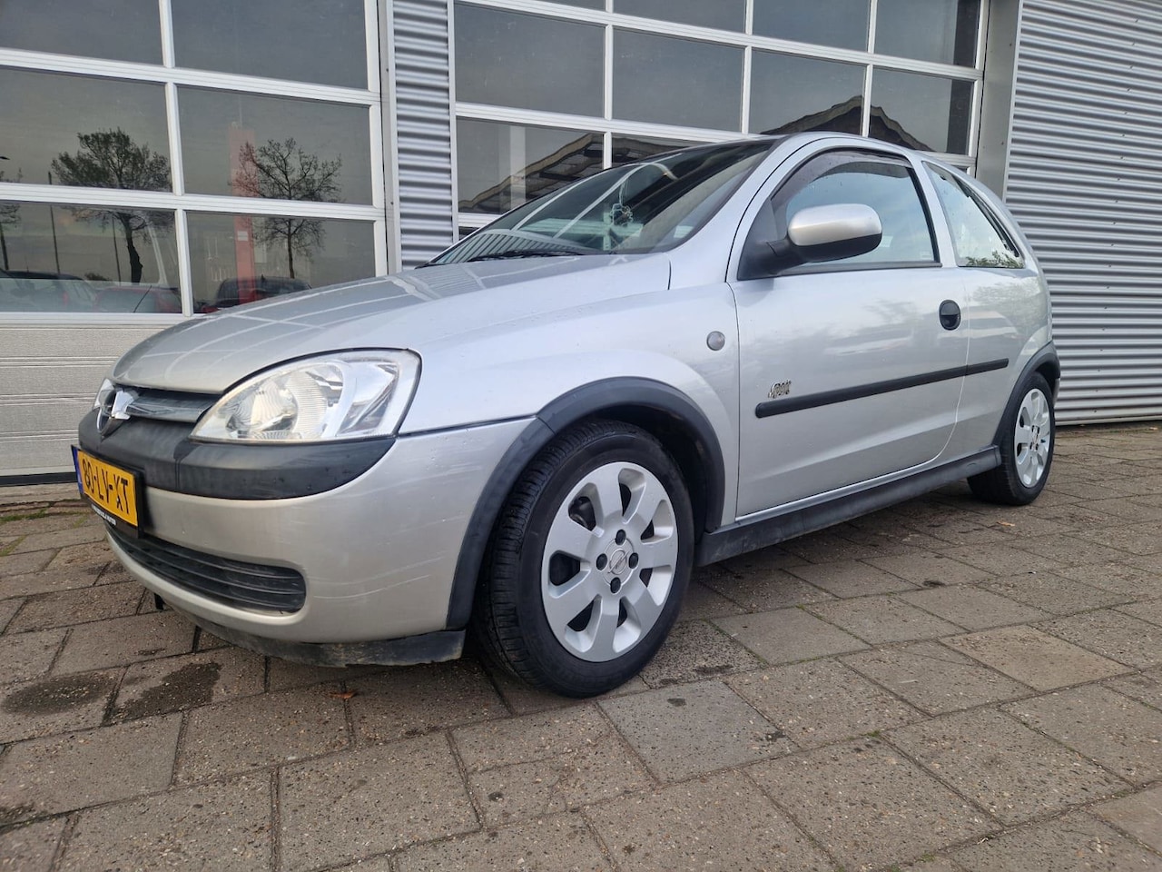 Opel Corsa - 1.2-16V Sport 1.2-16V Sport - AutoWereld.nl