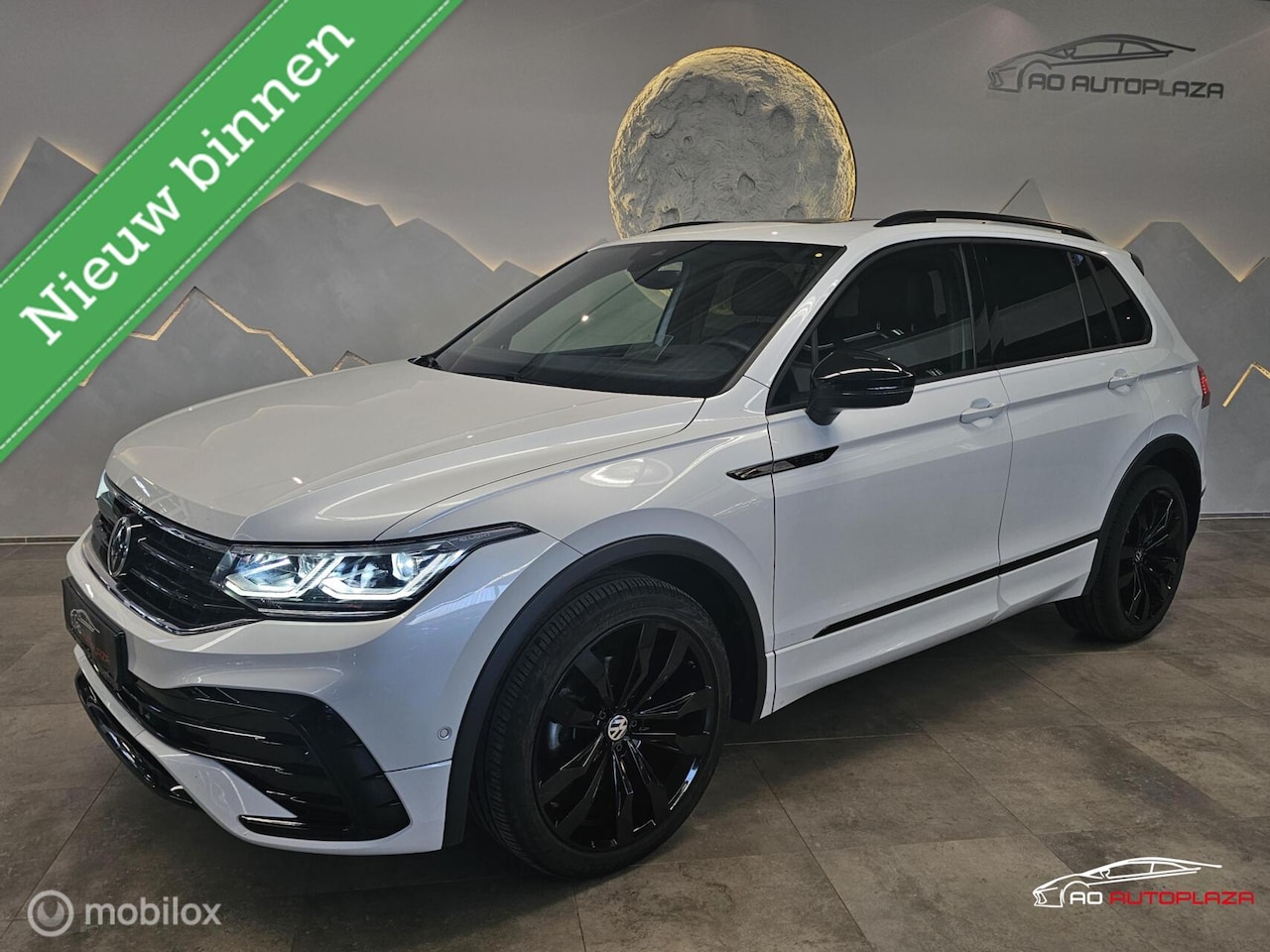 Volkswagen Tiguan - 1.5 TSI 3x R-Line Panorama/Black Style/HUD - AutoWereld.nl