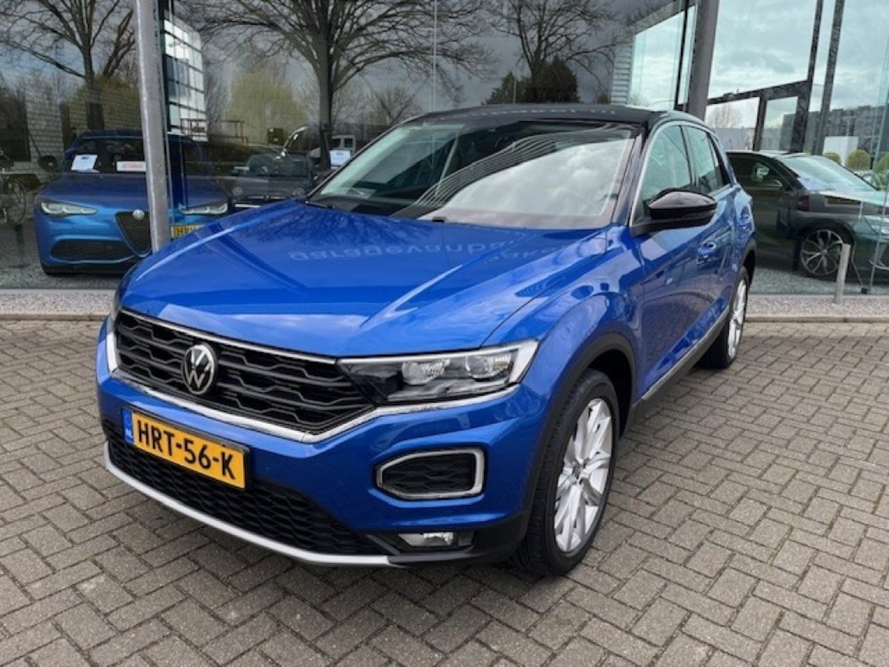 Volkswagen T-Roc - 1.5 TSI SPORT AUTOMAAT VIRTUAL DASHBOARD CARPLAY AD CRUISE - AutoWereld.nl