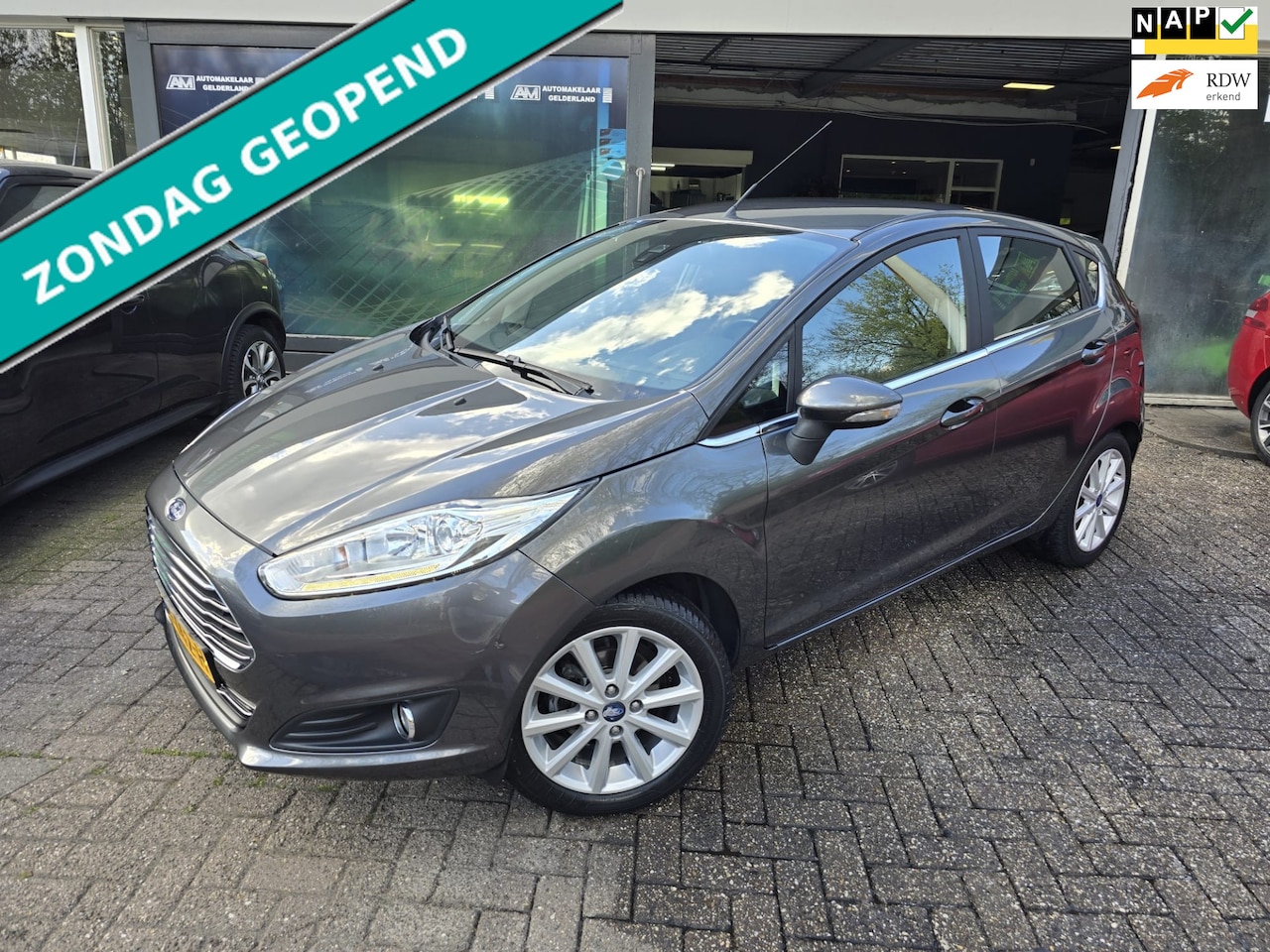 Ford Fiesta - 1.0 EcoBoost Titanium | 2E EIGENAAR | 12MND GARANTIE | NW DISTR | AIRCO | NAVI | - AutoWereld.nl
