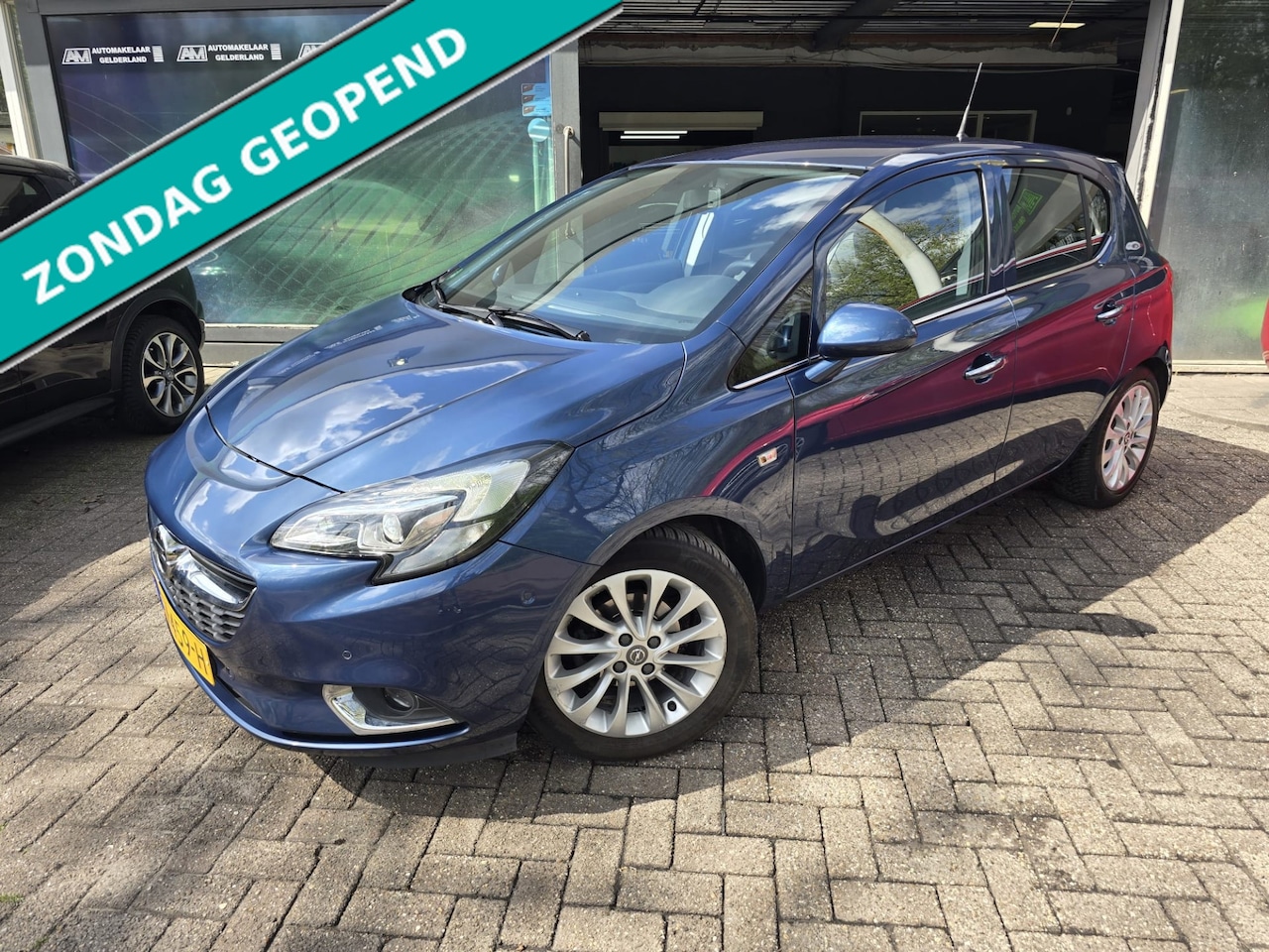 Opel Corsa - 1.4 Cosmo | AUTOMAAT | 12MND GARANTIE | CAMERA | STOEL-STUURVERWARMING | - AutoWereld.nl