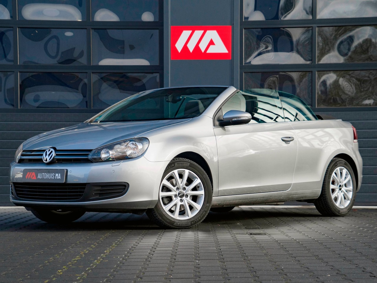 Volkswagen Golf Cabriolet - 1.4 TSI PDC|Stoelverwarming|Cruise|Clima|Windscherm|Velgen|Elektrische kap - AutoWereld.nl