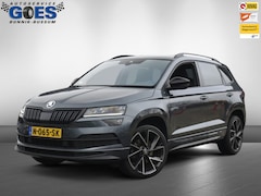 Skoda Karoq - (financiering mogelijk) 1.5 TSI Sportline Busines /trekhaak/camera/stuurverwarming