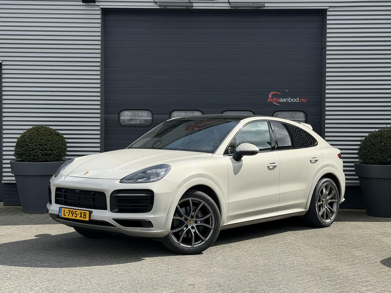 Porsche Cayenne Coupé - 3.0 E-Hybrid | Sport Chrono | 360* Camera | Panoramadak | Luchtvering | Bose | DAB | Lane - AutoWereld.nl