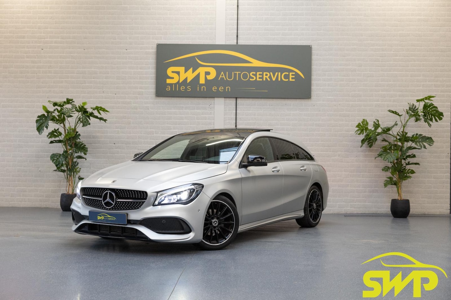 Mercedes-Benz CLA-klasse Shooting Brake - 180 | AMG | MAGNO-ZILVER | Pano | Navi | Dodehoek | Memory | Elektr Stoel | Multispaak | E - AutoWereld.nl