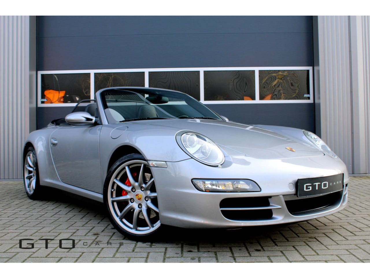 Porsche 911 Cabrio - 3.8 Carrera 4S Bose | Complete Historie | Sportstoelen | Lederen interieur | Sport Chrono - AutoWereld.nl