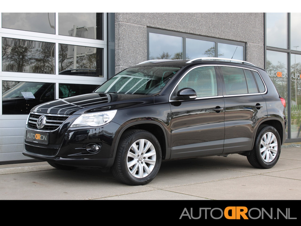 Volkswagen Tiguan - 1.4 TSI Sport&Style Trekhaak Navigatie Cruise Control - AutoWereld.nl
