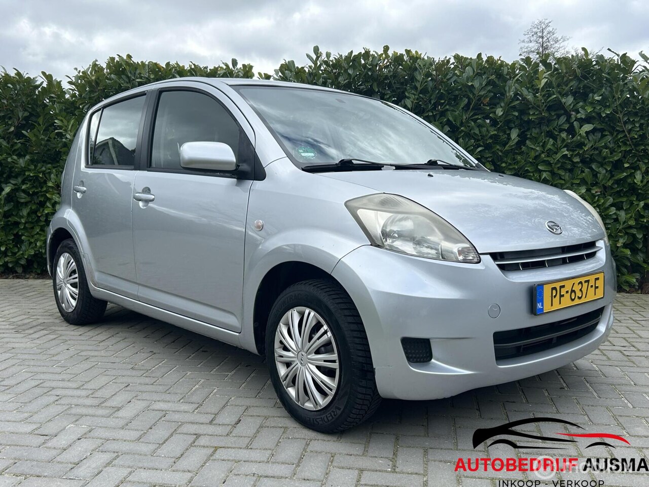 Daihatsu Sirion 2 - 1.0-12V Premium grijs 2007 APK 2027 Airco - AutoWereld.nl