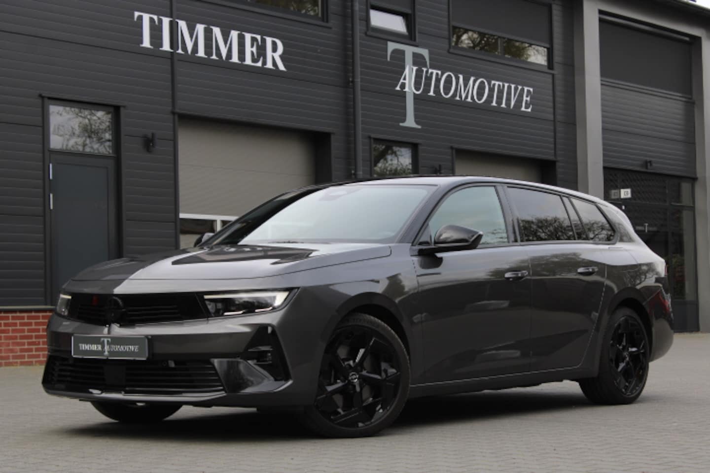 Opel Astra Sports Tourer - 1.6 Turbo Plug In Hybrid GSe - Vulcan Grey -Stoelverwarming - Stuurverwarming - 19 inch - - AutoWereld.nl