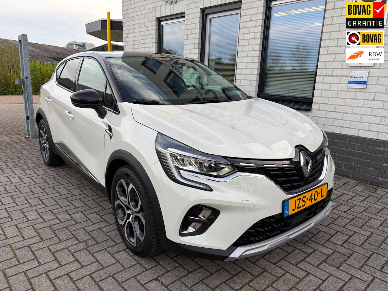 Renault Captur - 1.6 E-Tech Plug-in Hybrid 160 Business / Trekhaak / Camera / Telefoon / Carplay / Navigati - AutoWereld.nl