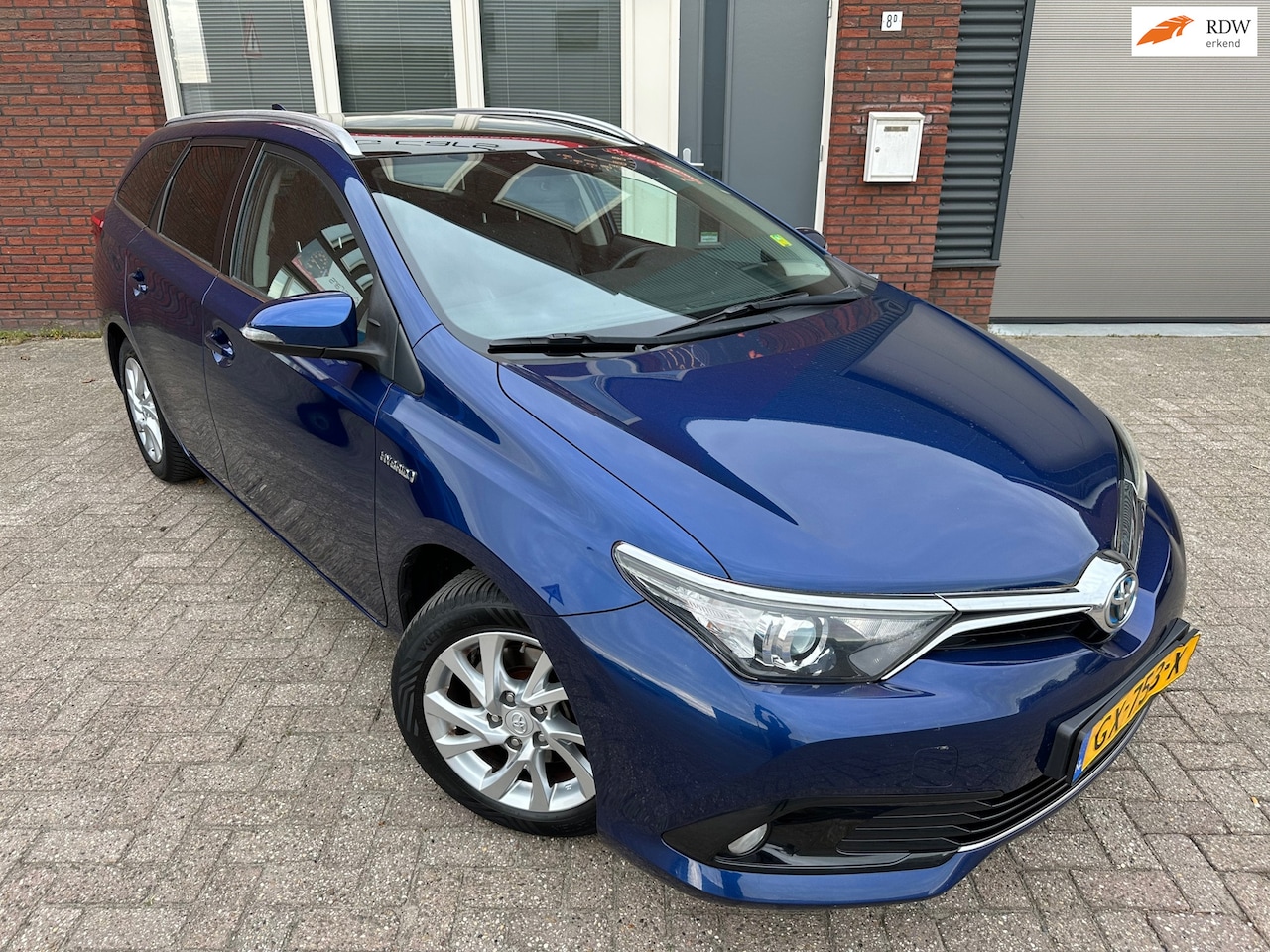 Toyota Auris - 1.8 Hybrid Lease Pro / Pano / Navi / Camera / PDC / DAB / NAP - AutoWereld.nl