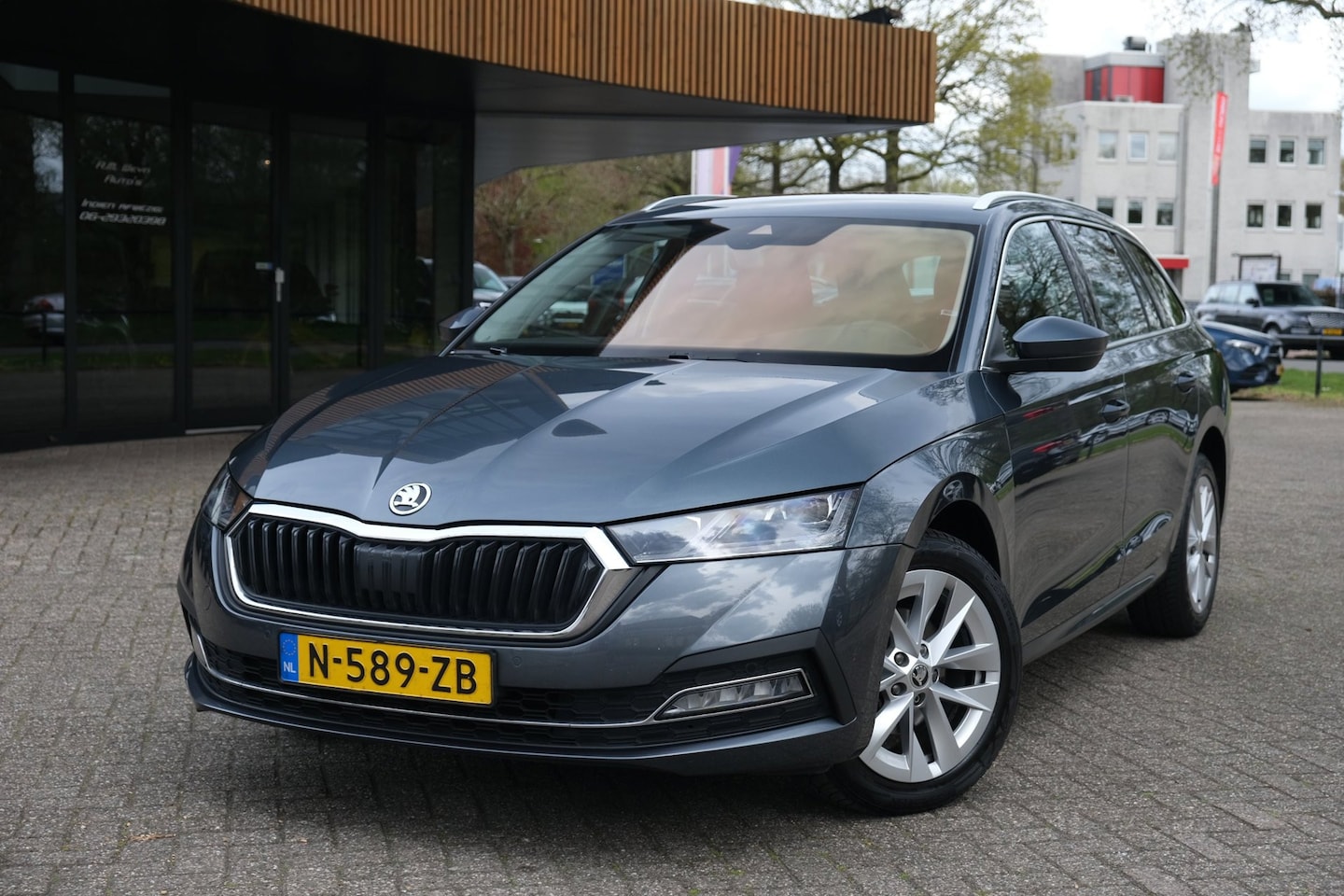 Skoda Octavia Combi - 1.0 e-TSI Ambition|ACC|Camera|Stoelverwarming|Lane|Keyless - AutoWereld.nl