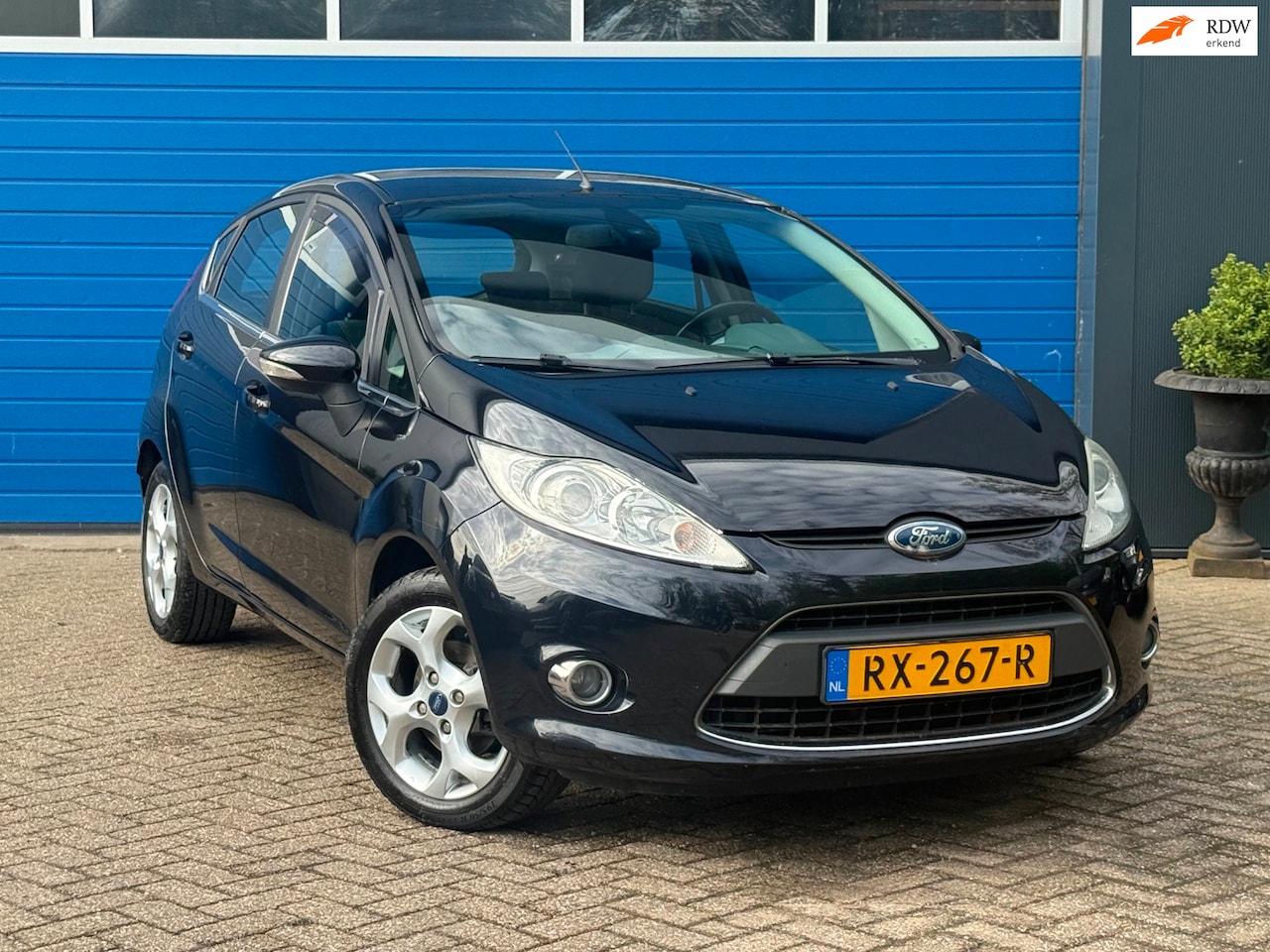 Ford Fiesta - 1.25 Ghia 5Drs|Climate - AutoWereld.nl