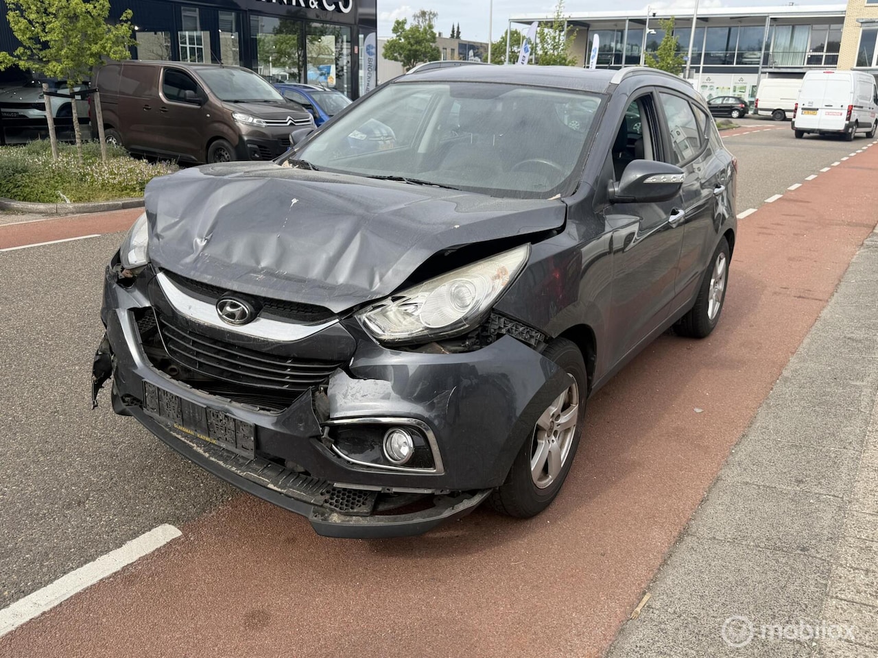 Hyundai ix35 - 2.0i VOORSCHADE / EXPORT PRIJS - AutoWereld.nl