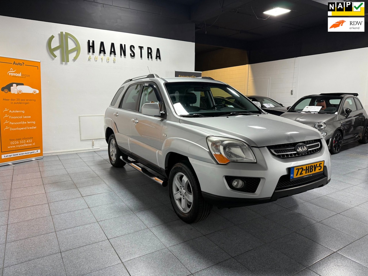 Kia Sportage - 2.0 CVVT X-ecutive 146.895 Km NAP NW Banden! Trekhaak. - AutoWereld.nl