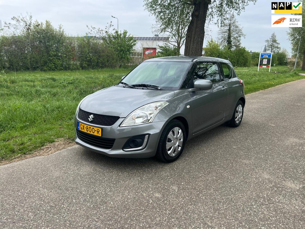 Suzuki Swift - 1.2 Comfort EASSS Airco Navi Stoelverwarming Pdc Achter - AutoWereld.nl