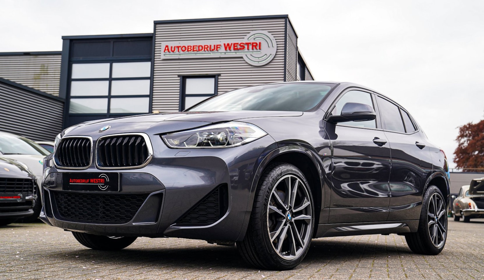 BMW X2 - XDrive20i High Executive | Stoelverwarming | Panorama | Head Up Display | M Sport onderste - AutoWereld.nl