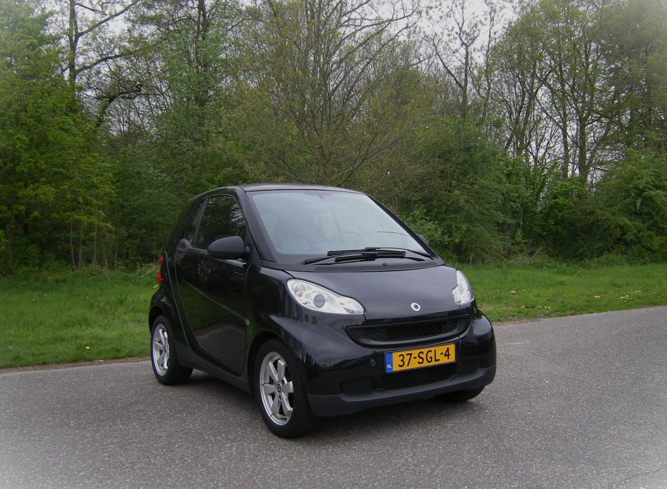 Smart Fortwo coupé - 1.0 mhd Pure . AUTOMAAT . Airco . Glazen dak . LMV . enz - AutoWereld.nl