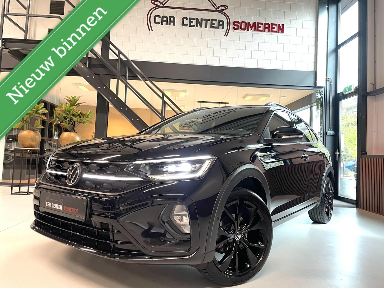 Volkswagen Taigo - 1.5 TSI R-Line Business Black Style/ Cam/ Beats/ IQ LED/ Keyless/ 18"LMV - AutoWereld.nl