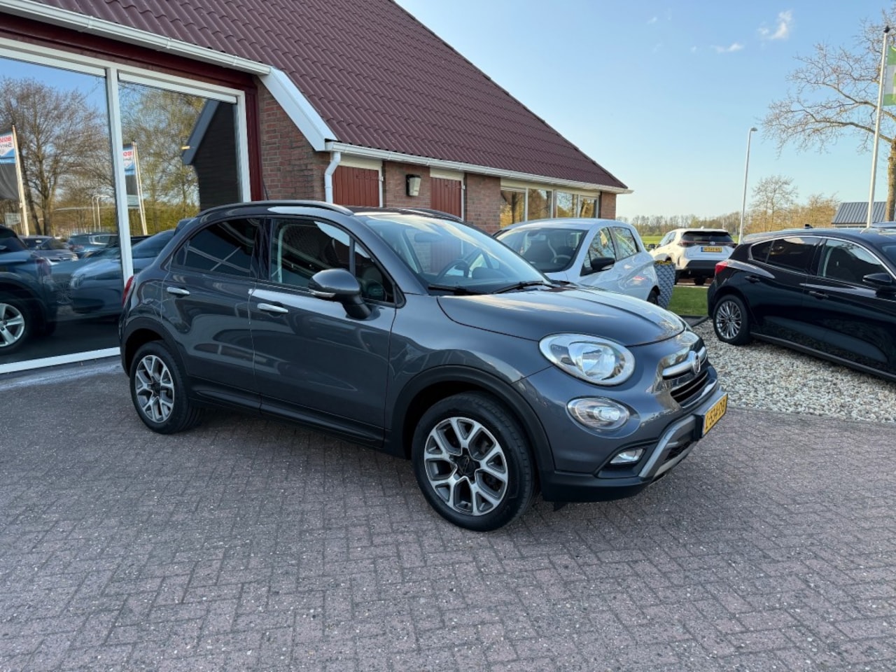 Fiat 500 X - 1.4 T M-AIR OPENING EDITION 140 PK! SLECHTS 86721 KM HOGE ZIT en INSTAP - AutoWereld.nl