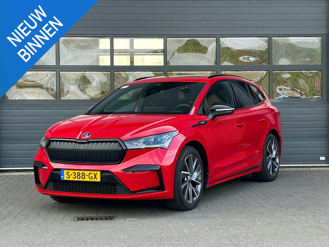 Skoda Enyaq iV - 80 SPORTLINE I AUTOMAAT I GROOT ACCUPAKKET I SCHUIF/KANTELDAK I STOELVERWARMING I NAVIGATI - AutoWereld.nl