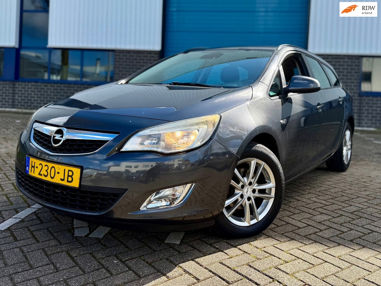Opel Astra Sports Tourer - 1.4 Turbo Edition * STOELVERWARMING * - AutoWereld.nl