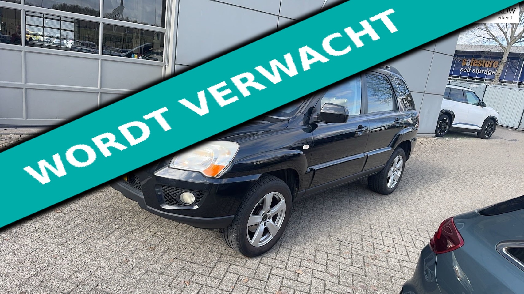 Kia Sportage - 2.0 CVVT 142pk Clima Cruise Leder Schuifdak Trekhaak 1400kg. - AutoWereld.nl