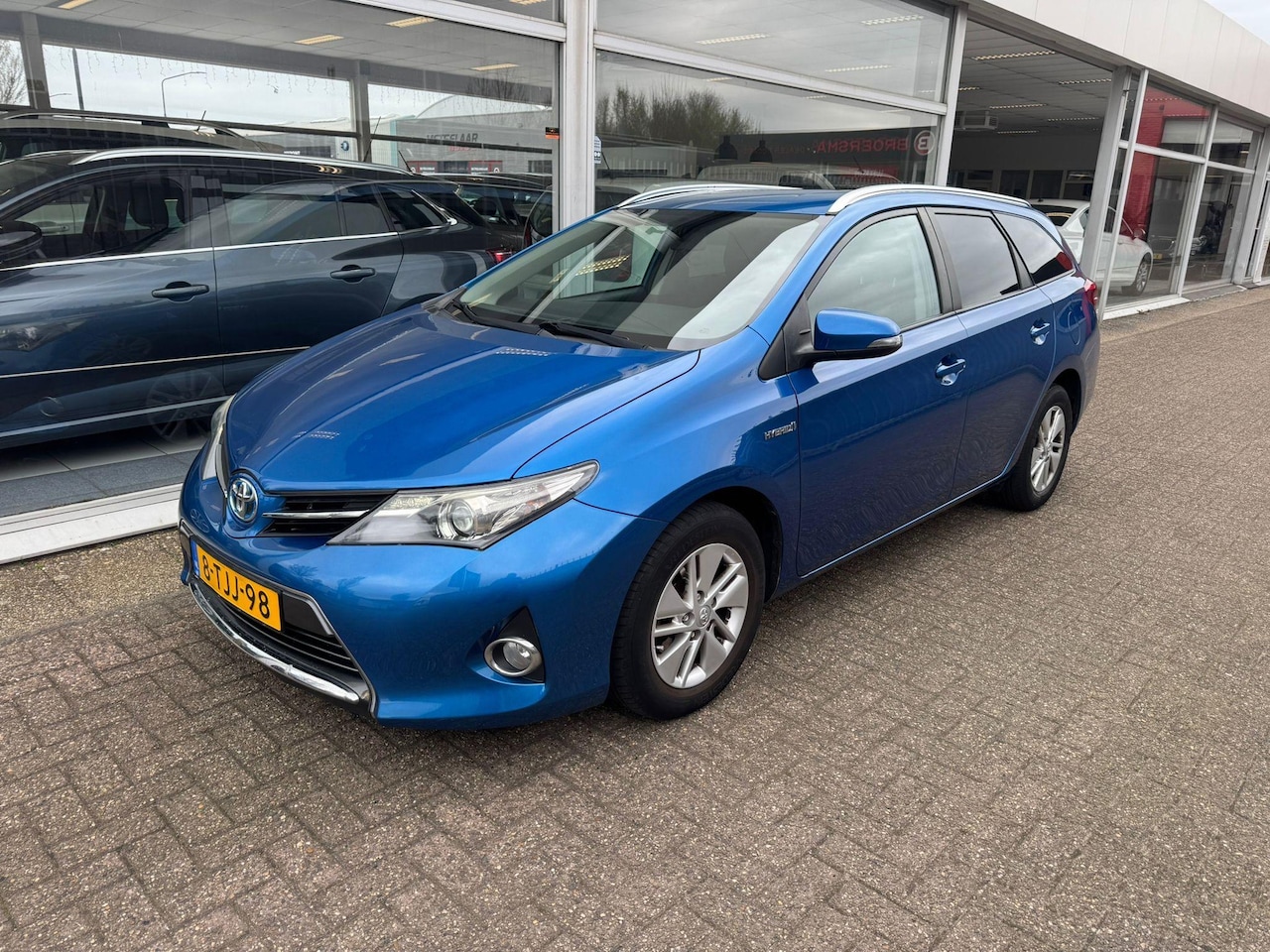 Toyota Auris Touring Sports - 1.8 Hybrid Aspiration | 2e eigenaar | Automaat | Trekhaak | Airco | Navigatie | Cruise con - AutoWereld.nl