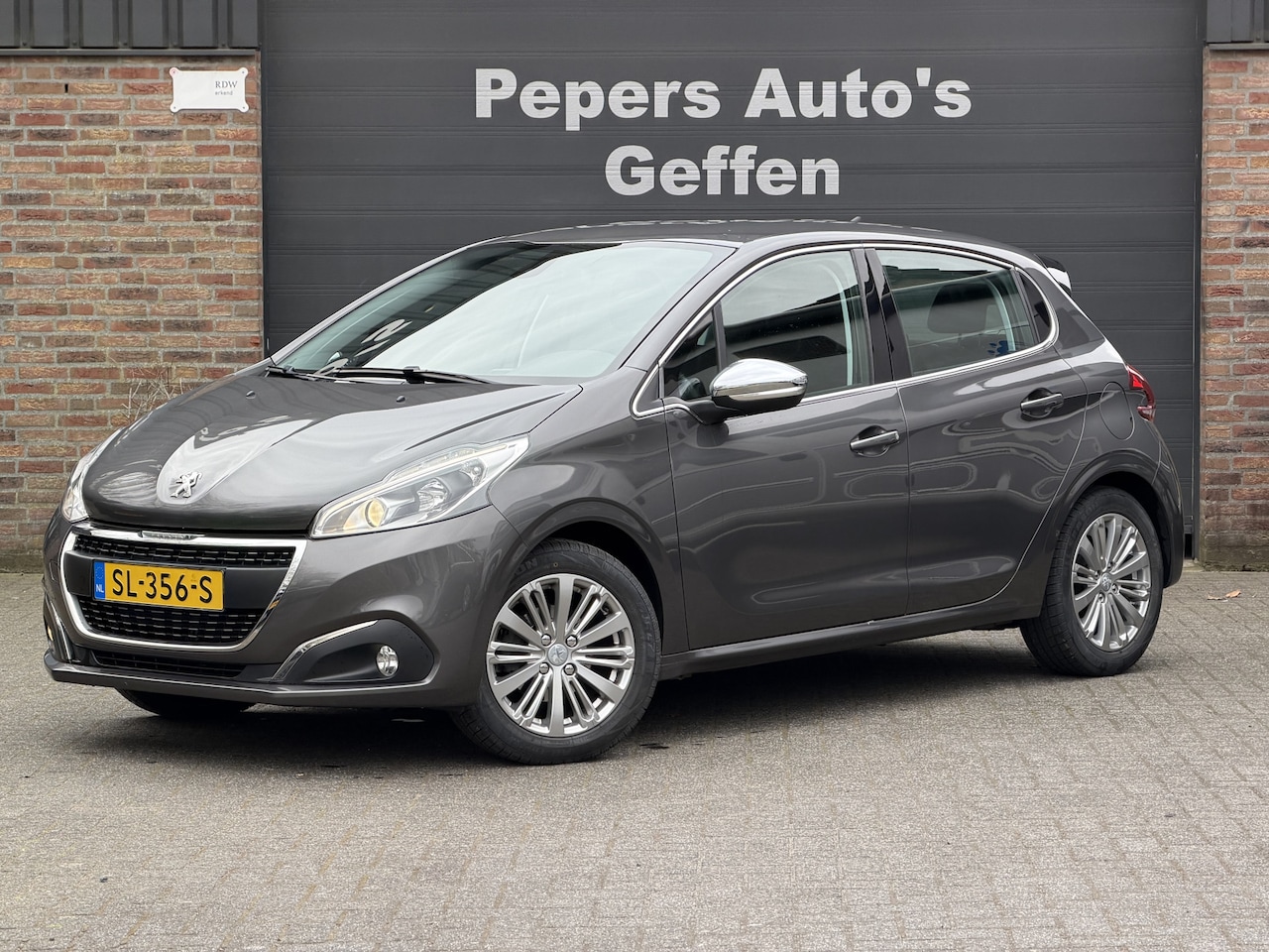Peugeot 208 - 1.2 PureTech Allure Carplay Climate / Cruise Control - AutoWereld.nl