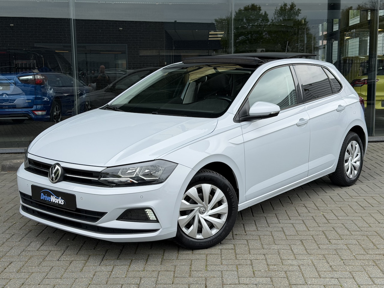 Volkswagen Polo - 1.0 TSI Comfortline | Panorama | Interesse in een bezichtiging of proefrit, bel of app met - AutoWereld.nl