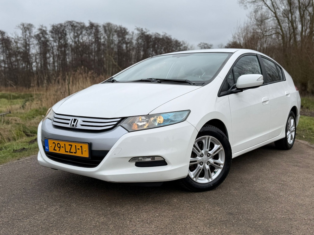 Honda Insight - 1.3 Comfort Hybrid Automaat Radio-CD Airco Cruise Control NAP - AutoWereld.nl