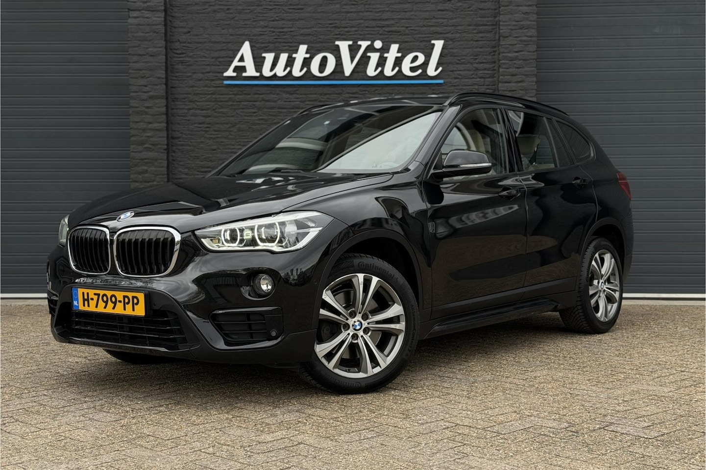BMW X1 - sDrive20i Sportline | Panodak | Sportleder | Memory | LED | NAVI - AutoWereld.nl