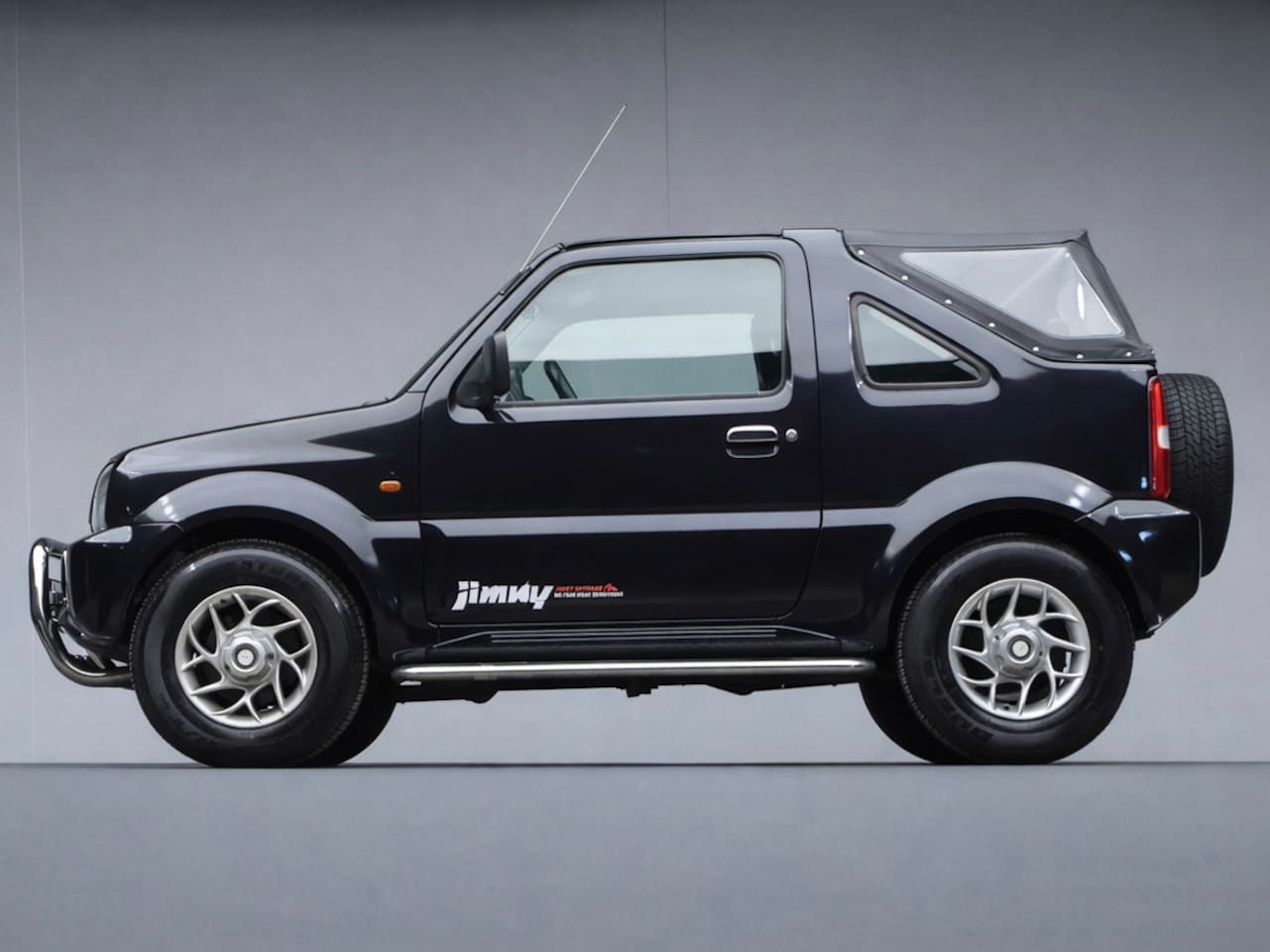 Suzuki Jimny - 1.3 JLX CABRIO (LEDER,4x4,NIEUWE APK,GEEN ROEST,NETTESTAAT) - AutoWereld.nl