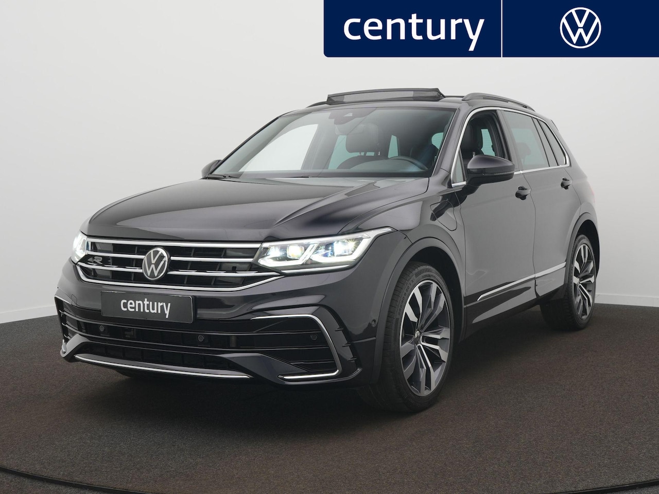 Volkswagen Tiguan - 1.4 TSI eHybrid R-Line Business DSG / Panoramadak / Adaptive cruise / Navi / Leer - AutoWereld.nl