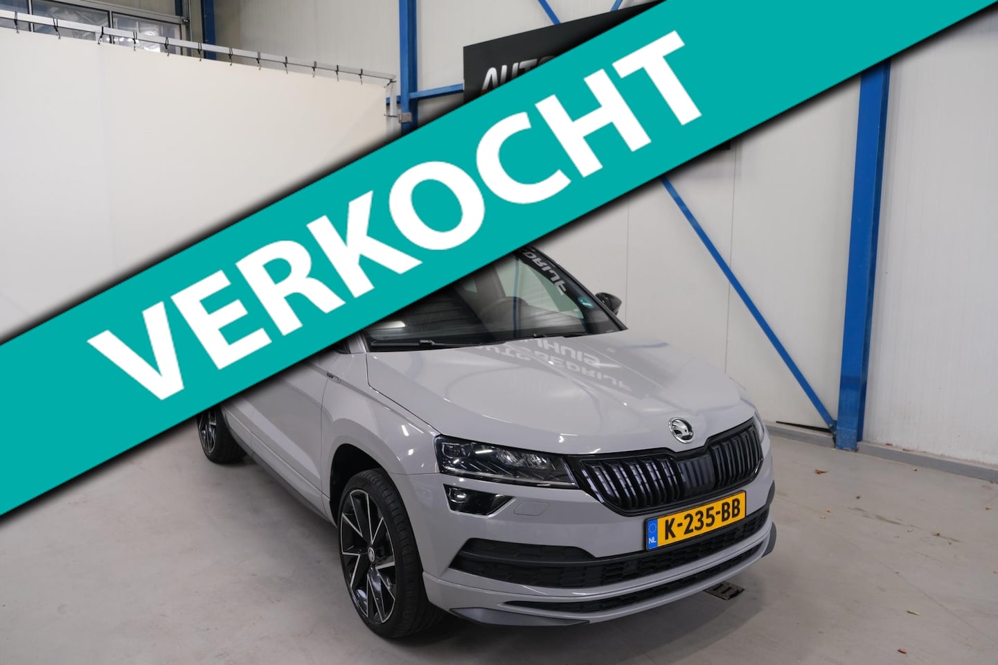 Skoda Karoq - 1.5 TSI ACT Sportline Business - N.A.P. Airco, Cruise, Navi, PDC, Camera, Schuifdak, Trekh - AutoWereld.nl